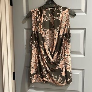 Sleeveless Cabi blouse in chocolate with blush floral pattern. Draped front.